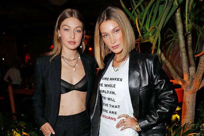 LONDON, ENGLAND - SEPTEMBER 16: Gigi Hadid and Bella Hadid attend the LOVE & YouTube LFW party supported by Perriet-Jouet and hosted by Katie Grand & Derek Blasberg at Decimo at The Standard, London, on September 16, 2019 in London, England. (Photo by David M. Benett/Dave Benett/Getty Images for LOVE Magazine)
