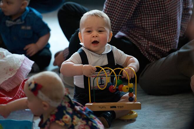 WELLINGTON, NZ - APRIL 09: Prince George of Cambridge plays during a Plunket nurse and parents group visit at Government House on April 9, 2014 in Wellington, New Zealand. Plunket is a national not-for-profit organization that provides care for children and families in New Zealand. The Duke and Duchess of Cambridge are on a three-week tour of Australia and New Zealand, the first official trip overseas with their son, Prince George of Cambridge. (Photo by Marty Melville-Pool/Getty Images)
