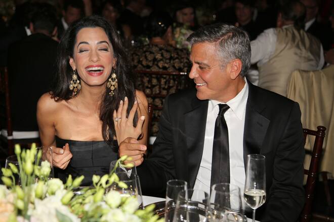 FLORENCE, ITALY - SEPTEMBER 06: George Clooney (R) and fiance Amal Alamuddin attend the Celebrity Fight Night gala celebrating Celebrity Fight Night In Italy benefitting The Andrea Bocelli Foundation and The Muhammad Ali Parkinson Center on September 7, 2014 in Florence, Italy. (Photo by Rachel Murray/Getty Images for Celebrity Fight Night)