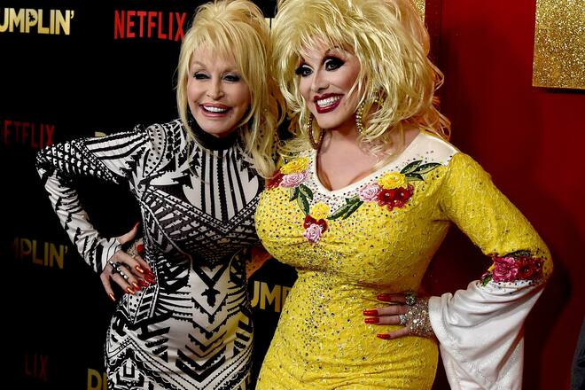 LOS ANGELES, CA - DECEMBER 06: Dolly Parton (L) and Dolly Parton impersonator Jason CoZmo arrive at the premiere of Netflix's "Dumplin'" at the Chinese Theater on December 6, 2018 in Los Angeles, California. (Photo by Kevin Winter/Getty Images)