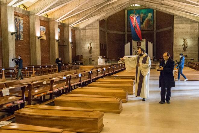 Seriate. Bergamo. Blessing of 90 bodies by Don Marcello Crotti parish priest of the church of San Giuseppe in Seriate waiting place before cremation of people who died as a result of COVID19 Coronavirus *** Local Caption *** 12386343