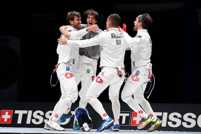 (180726) -- WUXI, July 26, 2018 -- Benjamin Steffen (1st L), Michele Niggeler (2nd L), Lucas Malcotti (2nd R) and Max Heinzer of Switzerland celebrate victory after the team men s epee final against South Korea at the Fencing World Championships in Wuxi, east China s Jiangsu Province, July 26, 2018. Switzerland won 36-31. ) (SP)CHINA-JIANGSU-WUXI-FENCING-WORLD CHAMPIONSHIPS (CN) LixBo PUBLICATIONxNOTxINxCHN