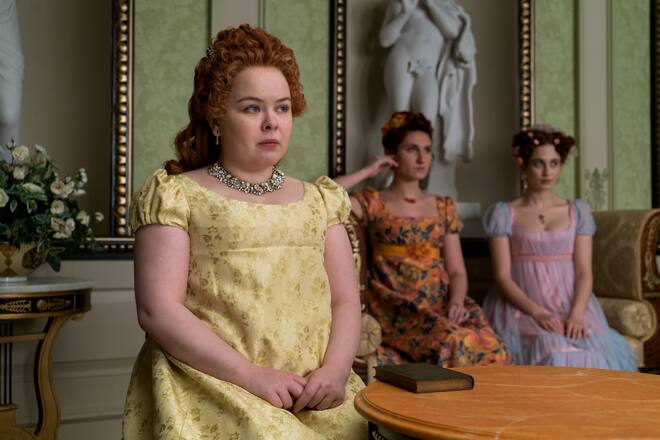 BRIDGERTON (L to R) NICOLA COUGHLAN as PENELOPE FEATHERINGTON, BESSIE CARTER as PRUDENCE FEATHERINGTON and HARRIET CAINS as PHILLIPA FEATHERINGTON in episode 10 of BRIDGERTON Cr. LIAM DANIEL/NETFLIX © 2020