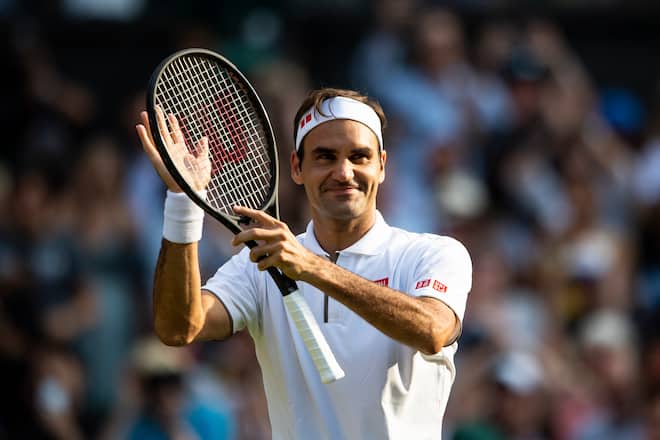 LONDON, ENGLAND - JULY 10: Roger Federer of Switzerland celebrates his victory over Kei Nishikori of Japan during Day 9 of The Championships - Wimbledon 2019 at All England Lawn Tennis and Croquet Club on July 10, 2019 in London, England. (Photo by TPN/Getty Images)
