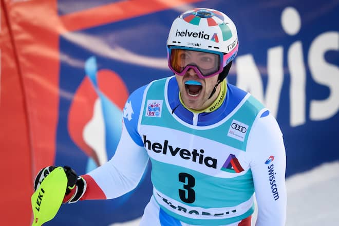 Switzerland's Daniel Yule celebrates after winning in the Men's Slalom race during the FIS Alpine Skiing World Cup, in Adelboden, on January 12, 2020. (Photo by FABRICE COFFRINI / AFP) (Photo by FABRICE COFFRINI/AFP via Getty Images)