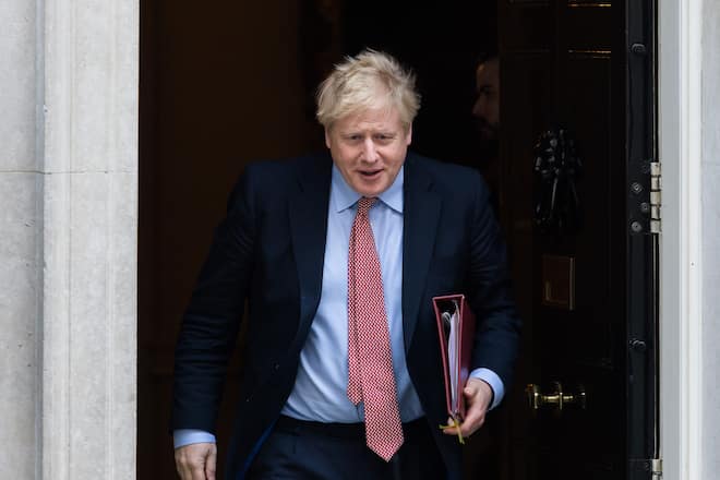 British Prime Minister Boris Johnson leaves 10 Downing Street for PMQs at the House of Commons on 25 March, 2020 in London, England. The month-long parliamentary Easter recess begins today as the UK is under lockdown imposed to slow down the spread of the Coronavirus. (Photo by WIktor Szymanowicz/NurPhoto)