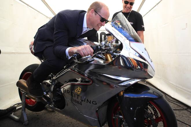 ISLE OF MAN - JUNE 6: Prince William, Duke of Cambridge tries out a motorbike at the Isle of Man TT on June 6, 2018, Isle of Man, United Kingdom. (Photo by Peter Byrne - WPA Pool/Getty Images)