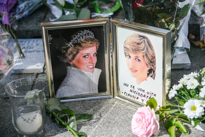 Iconic photos, flowers and messages dedicated to pay homage to Lady Diana to the 20th anniversary of her death adorn the plinth of the Flame of Liberty statue on August 31, 2017 in Paris, France. Princess Diana died in a car crash on August 31, 1997 near the Pont de l'Alma tunnel. The Flame of Liberty statue became the unofficial memorial to Diana, Princess of Wales. (Photo by Julien Mattia/NurPhoto via Getty Images)