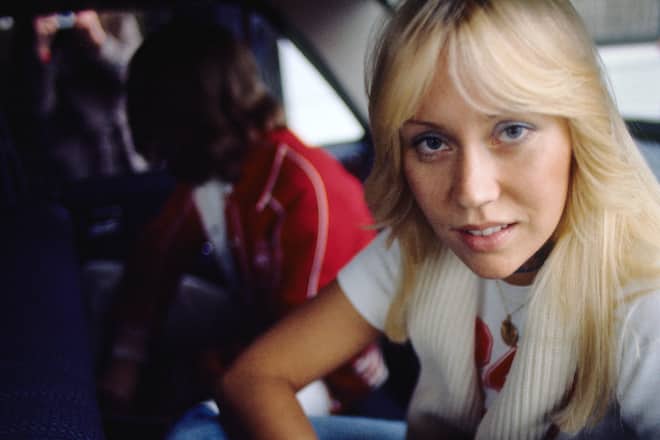Agnetha Faltskog of Abba arrives in a car to appear on a Dutch TV show 'een van de acht', The Hague, Netherlands, November 23, 1976. (Photo by Gijsbert Hanekroot/Redferns)