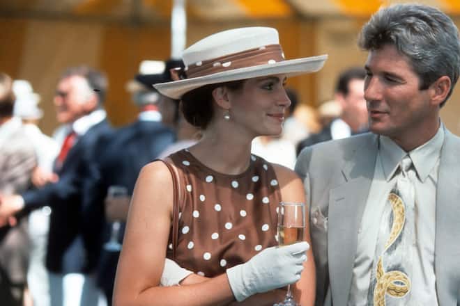 Julia Roberts has a drink with Richard Gere in a scene from the film 'Pretty Woman', 1990. (Photo by Buena Vista/Getty Images)