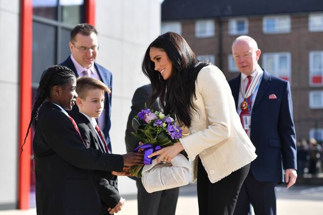 LONDON, ENGLAND - MARCH 06: Meghan, Duchess of Sussex visits the the Robert Clack Upper School in Dagenham to attend a special assembly ahead of International Womenâs Day (IWD) held on Sunday 8th March, on March 6, 2020 in London, England. (Photo by Ben Stansall-WPA Pool/Getty Images)