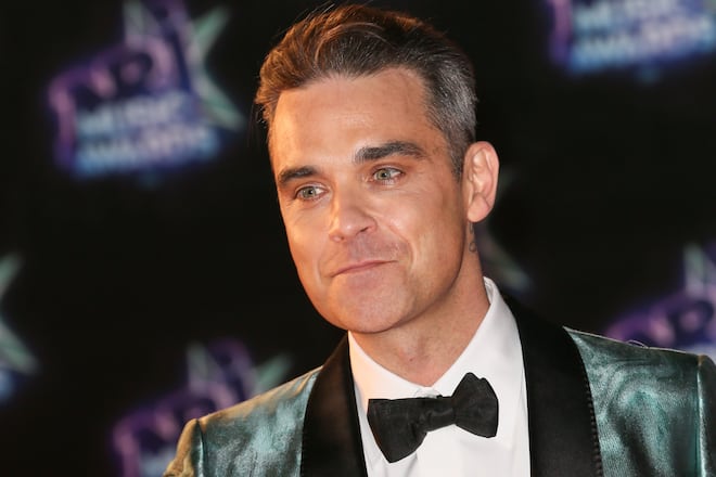 CANNES, FRANCE - NOVEMBER 12: Robbie Williams arrives at the 18th NRJ Music Awards at the Palais des Festivals on November 12, 2016 in Cannes, France. (Photo by Toni Anne Barson/FilmMagic)
