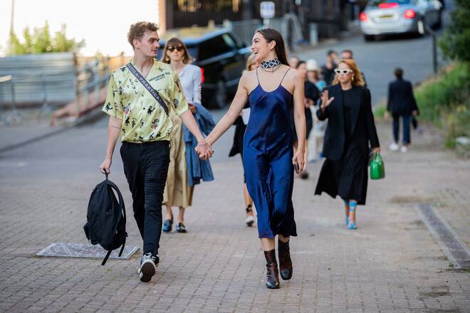 LONDON, ENGLAND - SEPTEMBER 15: A couple is seen outside Rocha during London Fashion Week September 2019 on September 15, 2019 in London, England. (Photo by Christian Vierig/Getty Images)
