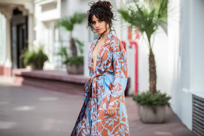 CANNES, FRANCE - JUNE 18: Camila Cabello is seen wearing pants and belted coat Johanna Ortiz on June 18, 2019 in Cannes, France. (Photo by Christian Vierig/Getty Images)