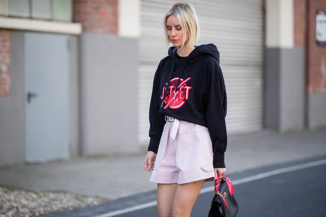 DUESSELDORF, GERMANY - MAY 05: Lisa Hahnbueck is seen wearing black hoody Jet Set, pink Isabel Marant shorts, Hermes Kelly bag on May 05, 2019 in Duesseldorf, Germany. (Photo by Christian Vierig/Getty Images)
