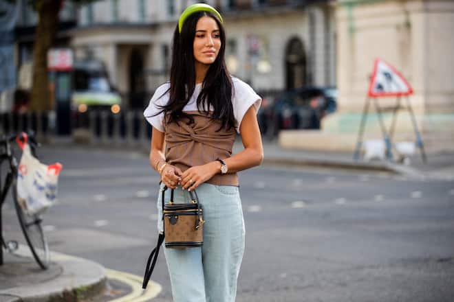LONDON, ENGLAND - SEPTEMBER 14: Tamara Kalinic is seen wearing hair loop, denim jeans, Louis Vuitton bag outside Toga during London Fashion Week September 2019 on September 14, 2019 in London, England. (Photo by Christian Vierig/Getty Images)