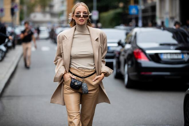 MILAN, ITALY - SEPTEMBER 19: Leonie Hanne is seen wearing beige grey turtleneck, jacket, pants, black Chanel mini belt bag outside the Max Mara show during Milan Fashion Week Spring/Summer 2020 on September 19, 2019 in Milan, Italy. (Photo by Christian Vierig/Getty Images)