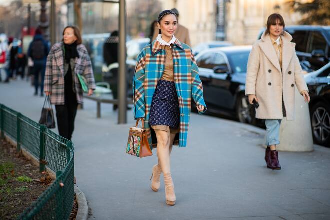 PARIS, FRANCE - JANUARY 21: A guest is seen wearing Louis Vuitton skirt, checkered coat outside Alexandre Vauthier during Paris Fashion Week - Haute Couture Spring/Summer 2020 on January 21, 2020 in Paris, France. (Photo by Christian Vierig/Getty Images )