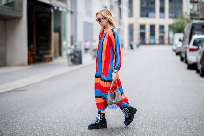 BERLIN, GERMANY - JULY 05: Sonia Lyson wearing multi color striped dress Zara, bag Jimmy Choo, tracking boots Blanca Miro x Edited is seen during the Berlin Fashion Week July 2018 on July 5, 2018 in Berlin, Germany. (Photo by Christian Vierig/Getty Images)