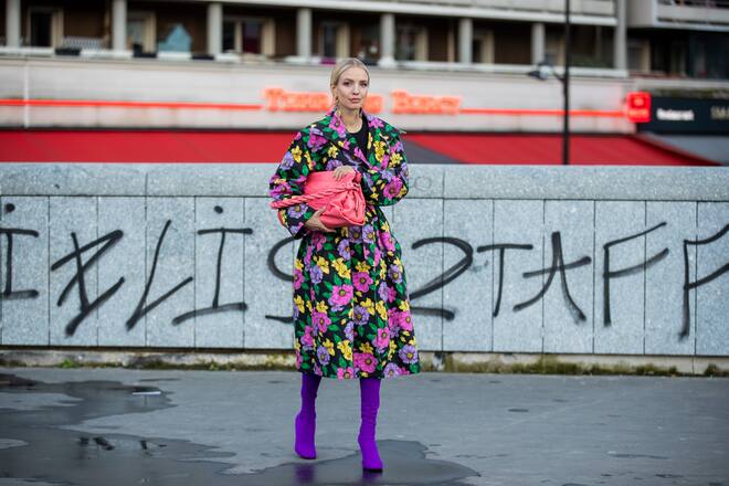 PARIS, FRANCE - FEBRUARY 25: Leonie Hanne seen wearing coat with floral print, pink bag, purple overknees outside Koche during Paris Fashion Week - Womenswear Fall/Winter 2020/2021 : Day Two on February 25, 2020 in Paris, France. (Photo by Christian Vierig/Getty Images)