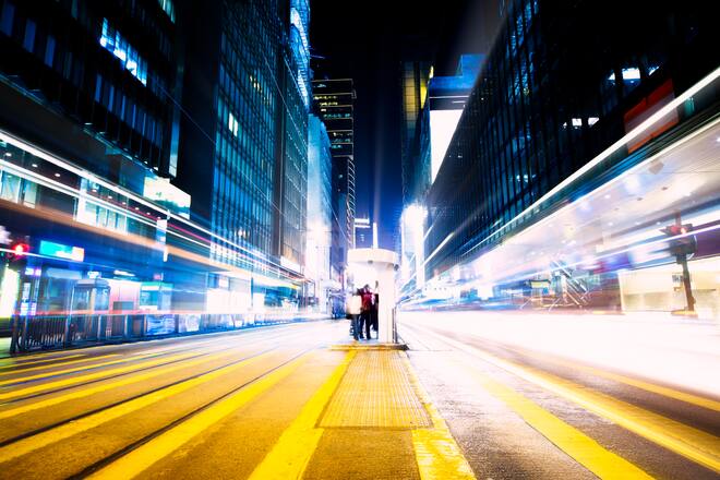 Night city road in motion. Motion blur.