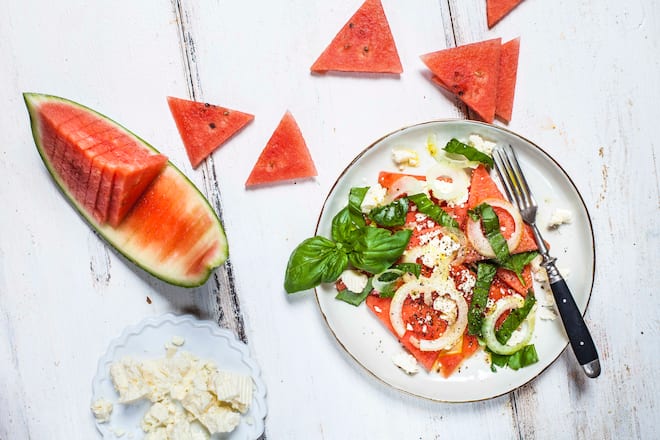 Watermelon salad with onions, feta and basil