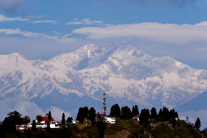 Snow peak Kangchenjunga mountain range can be seen in a hilly place of North Bengal, India, 24 December, 2019. (Photo by Indranil Aditya/NurPhoto via Getty Images)