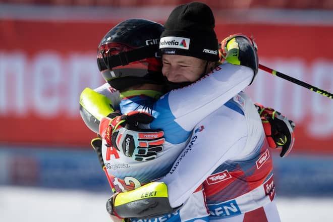 SOELDEN, AUSTRIA - OCTOBER 18: Gino Caviezel (left) and Marco Odermatt (right) both of Switzerland talk to each other after their second run in the Men's Giant Slalom of the Audi FIS Alpine Ski World Cup on October 18, 2020 in Soelden, Austria. (Photo by Andreas Schaad/Getty Images)