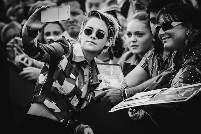 DEAUVILLE, FRANCE - SEPTEMBER 13: (EDITORS NOTE: This image was processed using digital filters and converted to black and white.) Kristen Stewart poses for the photographers after she unveiled her cabin sign given in tribute to her career along the Promenade des Planches during the 45th Deauville American Film Festival on September 13, 2019 in Deauville, France. (Photo by Francois G. Durand/Getty Images)