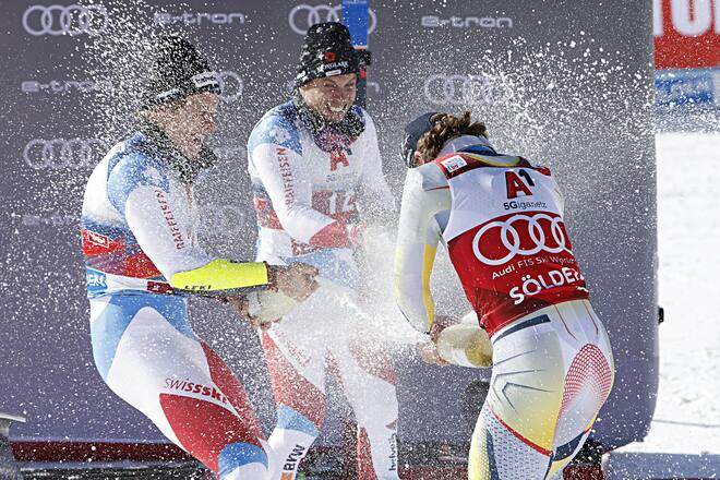 SOELDEN, AUSTRIA - OCTOBER 18: Marco Odermatt of Switzerland takes 2nd place, Lucas Braathen of Norway takes 1st place, Gino Caviezel of Switzerland takes 3rd place during the Audi FIS Alpine Ski World Cup Men's Giant Slalom on October 18, 2020 in Soelden, Austria. (Photo by Alexis Boichard/Agence Zoom/Getty Images)