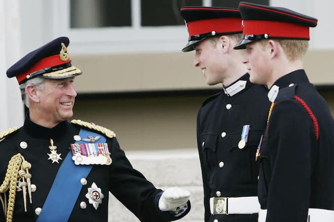 SURREY, ENGLAND - APRIL 12: Prince Harry (R) and Prince William stand on the steps of the Old College at Sandhurst Military Academy with their father Prince Charles, Prince of Wales after the Sovereign's Parade on April 12, 2006 in Surrey, England. (Photo by Tim Graham Photo Library via Getty Images)