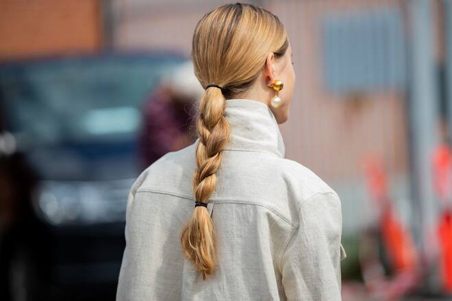 COPENHAGEN, DENMARK - AUGUST 08: Pernille Teisbaek is seen with pigtail outside By Malene Birger during Copenhagen Fashion Week Spring/Summer 2020 on August 08, 2019 in Copenhagen, Denmark. (Photo by Christian Vierig/Getty Images)