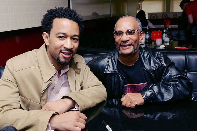 NEW YORK - JUNE 19: Singer John Legend poses with his father Ronald Stephens (on Father's Day) during an exclusive concert and fan signing session as part of his partnership with Target to celebrate Black Music Month at the Canal Room June 19, 2005 in New York City. Target releases a benefit CD compilation. (Photo by Evan Agostini/Getty Images)