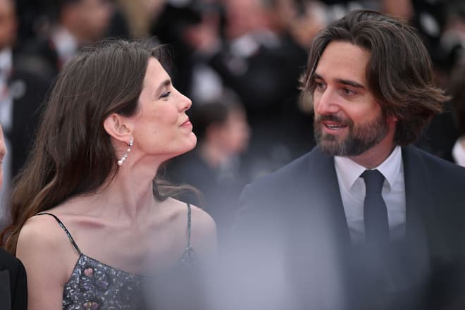 CANNES, FRANCE - MAY 20: Charlotte Casiraghi (L) and her partner French producer Dimitri Rassam (R) arrive for the premiere of the film Killers of the Flower Moon during the 76th edition of the Cannes Film Festival at Palais des Festivals in Cannes, France on May 20, 2023. (Photo by Mustafa Yalcin/Anadolu Agency via Getty Images)