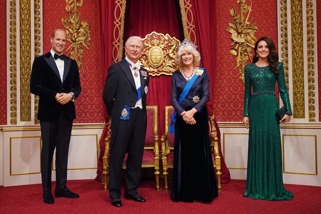 A new Queen Consort wax figure (2nd right) is added to existing figures of the Prince of Wales, King Charles III and the Princess of Wales, at Madame Tussauds in London, ahead of the coronation of King Charles III on May 6. Picture date: Wednesday April 26, 2023. (Photo by Yui Mok/PA Images via Getty Images)