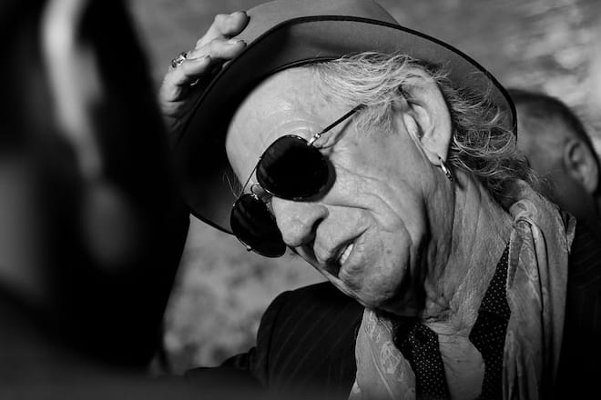 NEW YORK, NY - NOVEMBER 15: (EDITORS NOTE: Image was converted to black and white) Guitarist Keith Richards speaks to the media during The Rolling Stones Exhibitionism opening night held at Industria Superstudio on November 15, 2016 in New York City. (Photo by Brent N. Clarke/FilmMagic)