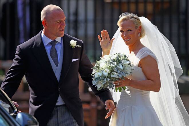 EDINBURGH, SCOTLAND - JULY 30: Mike Tindall and Zara Phillips depart after their Royal wedding at Canongate Kirk on July 30, 2011 in Edinburgh, Scotland. The Queen's granddaughter Zara Phillips will marry England rugby player Mike Tindall today at Canongate Kirk. Many royals are expected to attend including the Duke and Duchess of Cambridge. (Photo by Jeff J Mitchell/Getty Images)