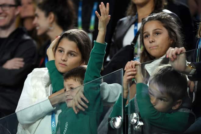 MELBOURNE, AUSTRALIA - JANUARY 20: The children of Roger Federer of Switzerland, Charlene, Myla, Lenny and Leo are seen during the Men's Singles first round match between Roger Federer of Switzerland and Steve Johnson of the United States of America on day one of the 2020 Australian Open at Melbourne Park on January 20, 2020 in Melbourne, Australia. (Photo by Quinn Rooney/Getty Images)