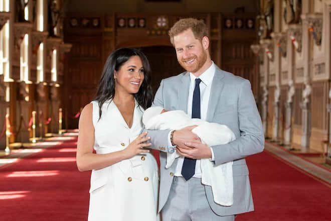 Britain's Prince Harry and Meghan, Duchess of Sussex, during a photocall with their newborn son, in St George's Hall at Windsor Castle, Windsor, south England, Wednesday May 8, 2019. Baby Sussex was born Monday at 5:26 a.m. (0426 GMT; 12:26 a.m. EDT) at an as-yet-undisclosed location. An overjoyed Harry said he and Meghan are "thinking" about names. (Dominic Lipinski/Pool via AP)
