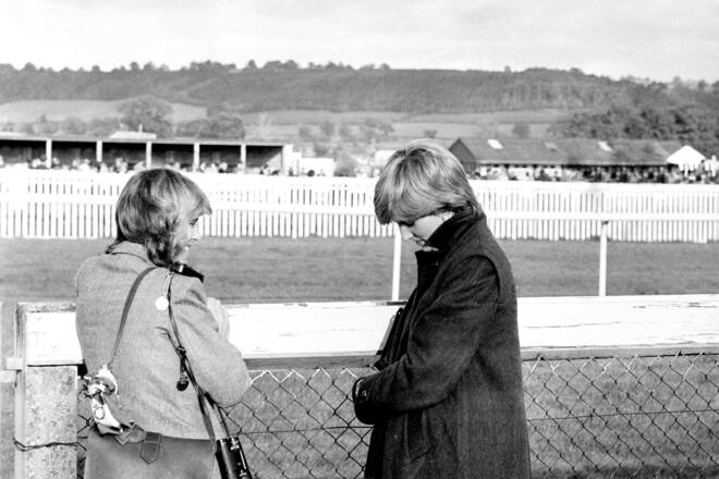 Camilla Parker-Bowles (left) and Lady Diana Spencer (later the Princess of Wales) at Ludlow racecourse to watch the Amateur Riders Handicap Steeplechase in which the Prince was competing. (Photo by PA Images via Getty Images)