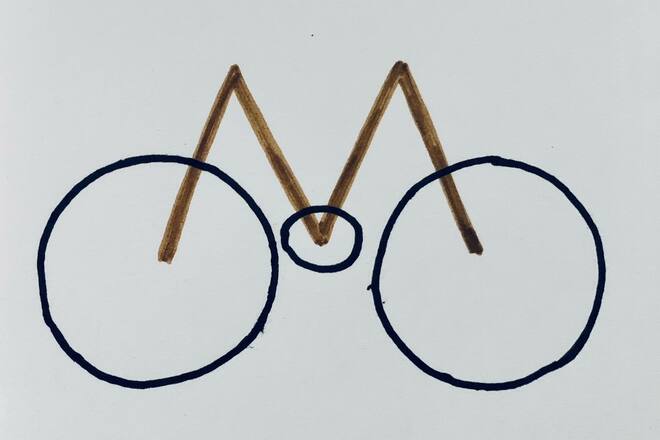 Ein M mit drei Kreisen