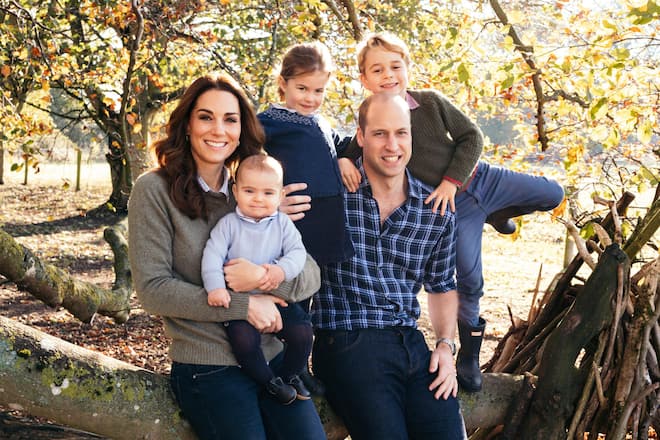 shows Prince William, Duke of Cambridge and Catherine, Duchess of Cambridge with their three children, Prince Louis, Princess Charlotte and Prince George (right) at Anmer Hall in Norfolk, United Kingdom.
