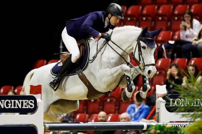 Springreiter Martin Fuchs auf Pferd Clooney beim CSI Basel Januar 2018