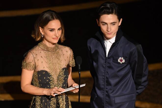 HOLLYWOOD, CALIFORNIA - FEBRUARY 09: (L-R) Natalie Portman and Timothée Chalamet speak onstage during the 92nd Annual Academy Awards at Dolby Theatre on February 09, 2020 in Hollywood, California. (Photo by Kevin Winter/Getty Images)
