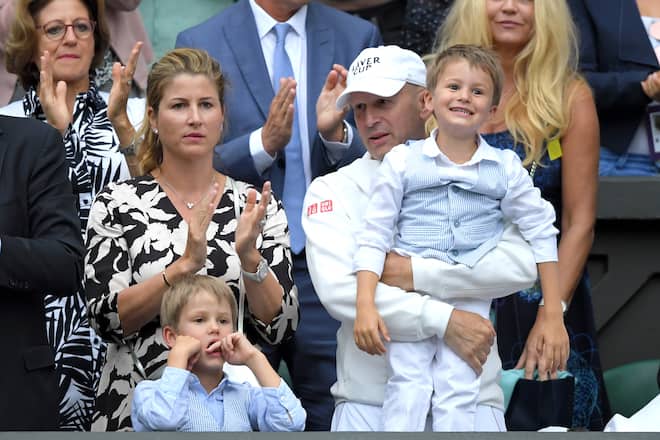 LONDON, ENGLAND - JULY 08: Mirka Federer with her sons as she watches her husband Roger Federer play on day seven of the Wimbledon Tennis Championships at All England Lawn Tennis and Croquet Club on July 08, 2019 in London, England. (Photo by Karwai Tang/Getty Images)