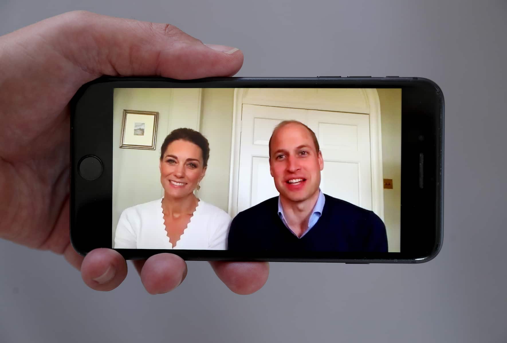 LONDON, ENGLAND - MAY 15: In this photo illustration Prince William, Duke of Cambridge and Catherine, Duchess of Cambridge speak to crisis volunteers on a video-call to mark the first anniversary of Shout85258 on May 15, 2020 in London, England. (Photo by Chris Jackson/Getty Images)