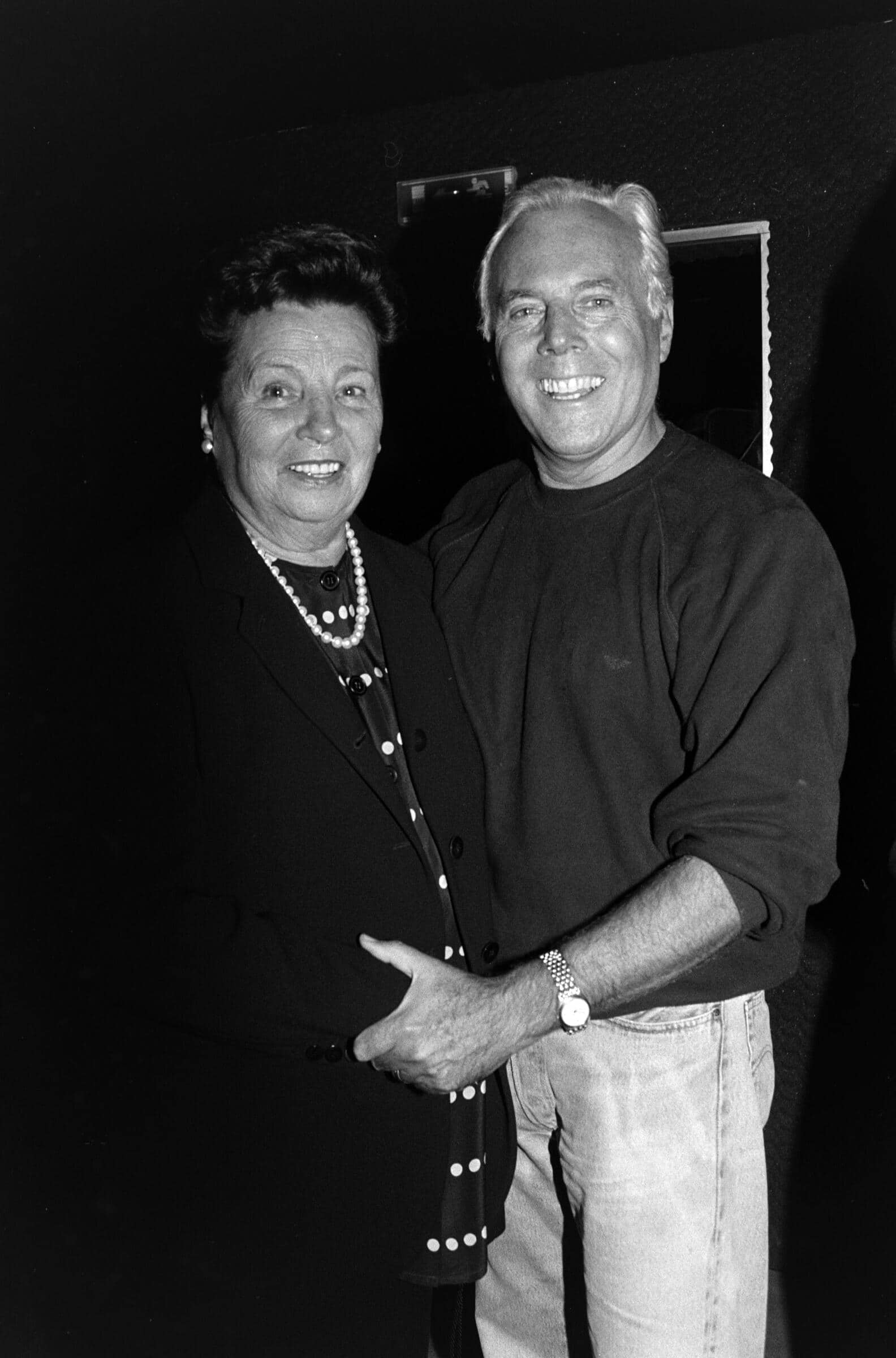 Designer Giorgio Armani and his mother, Maria Raimondi (Photo by Fairchild Archive/WWD/Penske Media via Getty Images)